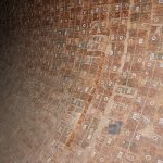 Analysis and Solutions to the Falling off of SiC Mullite Bricks in Rotary Kilns